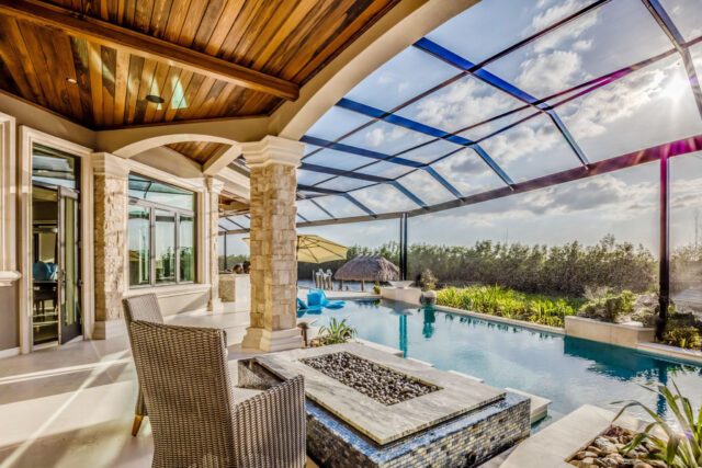 fire pit and wood ceiling covering add beauty to the patio